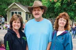 From right: Mary Wooldrige, Jim Alden and Judy Bernard pose for a photo during the Berthoud Day parade.  John Gardner/ the Surveyor 