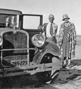 In 1931 Sid and Emma Davis stand by their car at the High Divide Ranch near Nunn. The couple spent winters in Berthoud and springs and summers at their sprawling wheat farm.