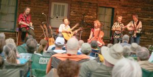 Left to right: Butch Hause, Joe Scott, Hannah Alkire, Ernie Martinez and Pete Huttlinger perform at the 11th Annual Farm Concert near Berthoud in August 2013. Surveyor file photo