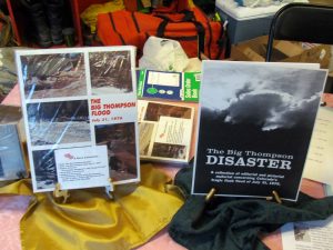After remembering the victims of two floods in the Big Thompson, the crowd enjoyed snacks and some purchased books about the flood.