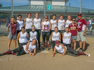 The Berthoud High School Lady Spartans celebrate their championship victory in the Maroon Division at the Spartan Classic Tournament  on Sept. 6 at Barnes Softball Complex in Loveland.  Jan Dowker / The Surveyor