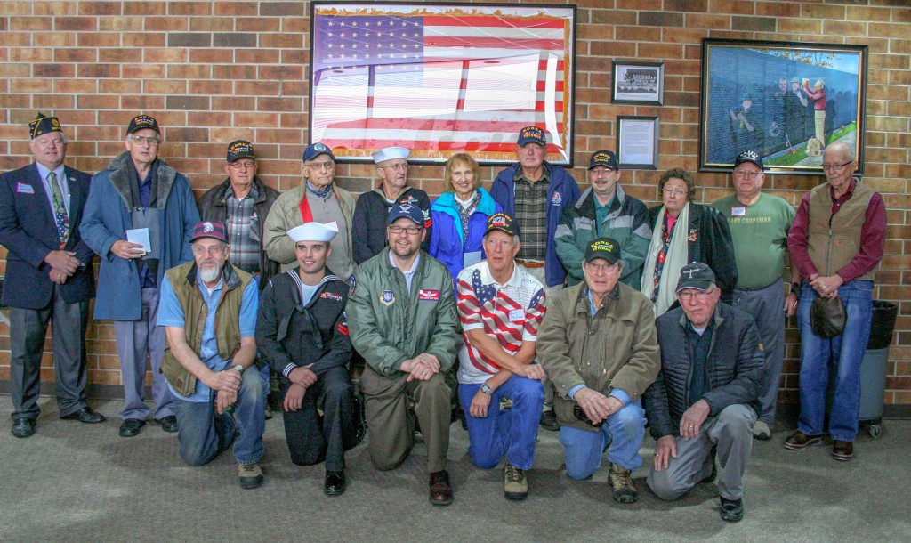 All the veterans in attendance posed for a photo outside of the Berthoud High School auditorium after the recognition ceremony on Nov. 11.  Jan Dowker / The Surveyor