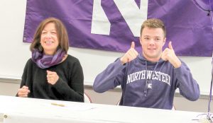 Berthoud High School student and swimmer Jack Thorne and his mother, Jodi Juskie, expresses their excitement after Jack committed to swim at Northwestern University in Illinois, on Nov. 13 at BHS. Thorne swims with the Thompson Valley High School and the Loveland Swim Clubs and is a two-time defending 4A state champion in the 100-yard backstroke and defending state champion in the 100 butterfly. Photo courtesy of Kim Skoric