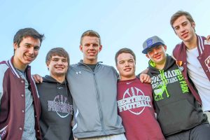 From left to right: Berthoud’s Brendon Stanley, Chad Ellis, Cody Braesch, Jimmy Fate, Stephen Lockard and Jackson Hall have played football together since fourth grade. Now, all juniors at BHS, they prepare to play in their first playoff game as Spartans.  Photo by Dan Megenhardt 