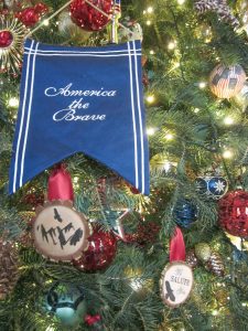 An ornament displays the Christmas tree’s theme, “America the Brave,” honoring all the men and women who have served in the U.S. military. 