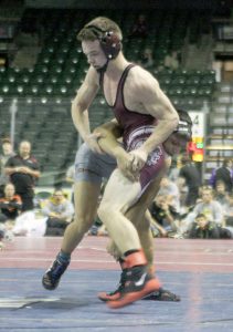 Berthoud junior Jimmy Fate wrestles Zack Garza from Dumas Texas at the Old Chicago Northern Colorado Christmas Tournament on Dec. 20. Both entered the match undefeated but only Fate left the match with the same undefeated record.  Karen Fate / The Surveyor