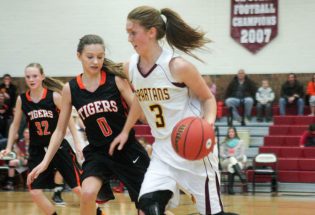 Lady Spartans rally past Erie In conference opener
