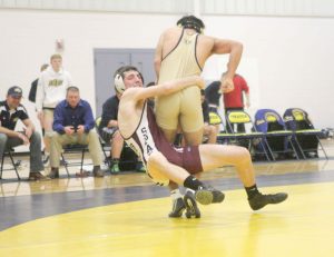 Berthoud’s Matt Bonds takes down his Olathe competitor on Jan. 9. Despite  putting up a good fight, the Spartans lost the dual 33-29.  Karen Fate / The Surveyor