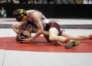 Berthoud freshman Colin Leypoldt wrestles Fort Lupton's Ruben Rodriguez in the first round consolation match. Leypoldt was defeated, 11-3 major dec. 