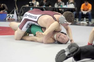 Berthoud's Chad Ellis wrestles Delta's Kory Mills in the 3A 170-pound championship match on Feb. 21 at Pepsi Center in Denver. Ellis won the match and his first state title. 