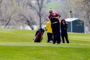 Berthoud sophomore Molli Boruff hits a tee shot on the par-5, 13th hole at The Mad Russian Golf Course in Milliken on April 20.  John Gardner / The Surveyor