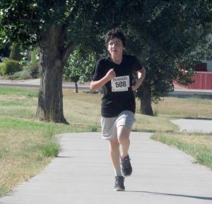 Carlos Gutierrez, an eighth grader at Turner Middle School, placed fourth overall in the Fall Family Fun Run on Sunday. Proceeds from the event go toward health and wellness programs at Berthoud schools. 