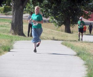 Naomi Williams of Estes Park was the first woman at the Fall Family Fun Run on Sunday. Proceeds from the event go toward health and wellness programs at Berthoud schools. 