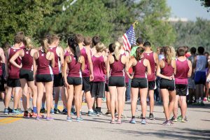 Berthoud Spartans paused to pay tribute to those involved in the events on 9/11/2001 before the start of the Liberty Bell Invitational. The boys team placed second and 18 Spartans set personal records at the meet. Photos courtesy of John Marquardt