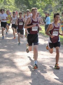 Working as a pack, Zac Marquardt, Josh Doyle and Murphy Vogele-Zimmerling race through the first mile in the Liberty Bell Invite last Friday. Photos courtesy of John Marquardt 