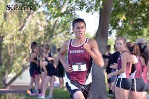 Senior runner Elijah Grewal pushes toward the finish line at the Loveland Sweethart meet at Loveland High School on Sept. 25. Grewal placed 11th overall and first place in his division. John Gardner / The Surveyor