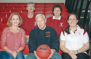 A basketball family tradition, started by John Beck (center) in the 1950s, continues today at Berthoud High School. John’s daughters, Kellie Diffendaffer (left) and Teresa Rimsky (upper right) both played basketball at BHS along with Teresa’s husband, Paul (top left). His granddaughter, Tara Olivas, was a player and is now an assistant coach at BHS. Photo by Angie Purdy / The Surveyor