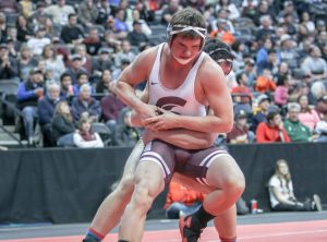 Berthoud’s Chad Ellis wrestles his way to a second consecutive state wrestling title against Olathe’s Chayden Harris in the Class 3A 195-pound division at the Colorado High School Athletic Association State Wrestling Tournament at Pepsi Center in Denver on Feb. 20. Karen Fate / The Surveyor