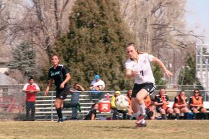 Berthoud’s Jade Glasser moves the ball up the field at home against Westminster on March 12. The Spartans won the contest 6-0. Angie Purdy / The surveyor