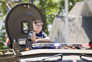 TMS student rides with SWAT in Berthoud Day Parade