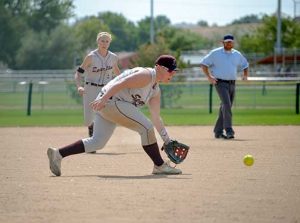 Berthoud third base Ashlynn Balliet prepares to scoop up a ball during the Friday contest against Cedaredge on the first day of the annual Spartans Classic softball tournament held at the Barnes Softball Complex in Loveland Sept. 9-10.  John Gardner / The Surveyor