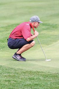 Berthoud's Jack Hummel lines up a putt during Tuesday’s round at Ute Creek golf course in Longmont.