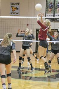 Berthoud’s Jessa Megenhardt sets the ball during the match against Roosevelt in Johnstown on Tuesday. The Spartans won the contest 3-0. Paula Megenhardt / The Surveyor