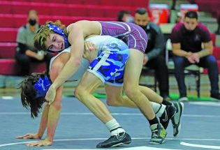 Wrestlers compete in the Warrior Classic