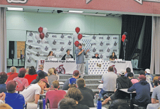 Four Spartans sign scholarships