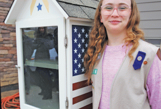 Girl Scout Zelda Stebbins gives veterans access to books